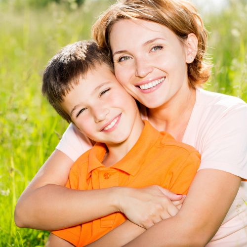 Happy Mother And Son Outdoor Portrait